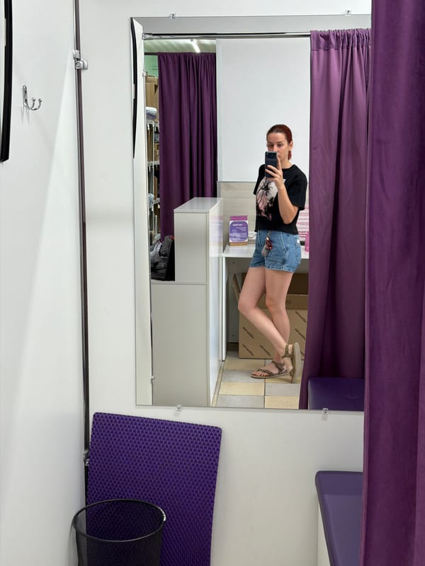 Woman takes fitting room selfies in Chaikovsky clothing store