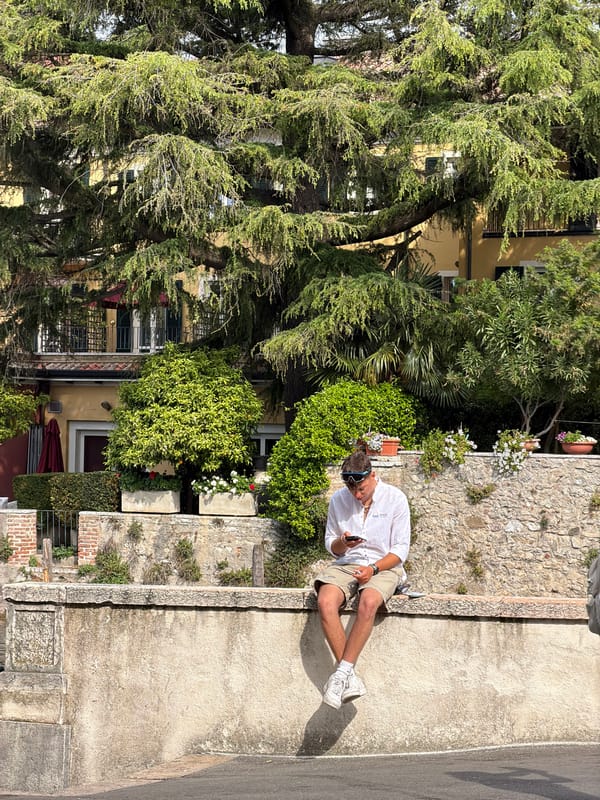 Morning tourist activity observed in lakeside Sirmione, Italy