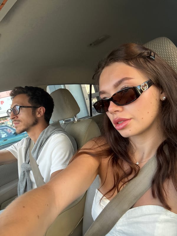 Two people photographed inside car in Larnaca, Cyprus