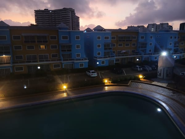 Dramatic twilight sky documented over Porlamar residential area