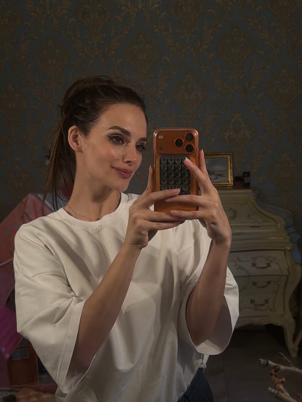 Selfies in an ornate Ufa interior with gilded mirror