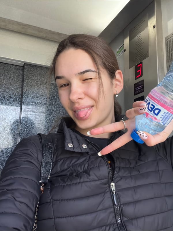 Woman photographed in marble elevator in Sofia