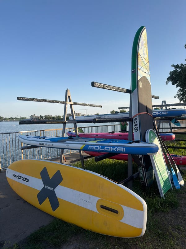 Woman spotted at Rostov-on-Don waterfront near paddleboard storage area