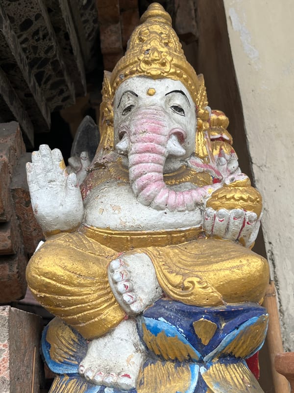 Weathered religious statues documented in Kuta Selatan, Indonesia