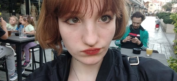 Woman takes selfies at Podgorica cafe