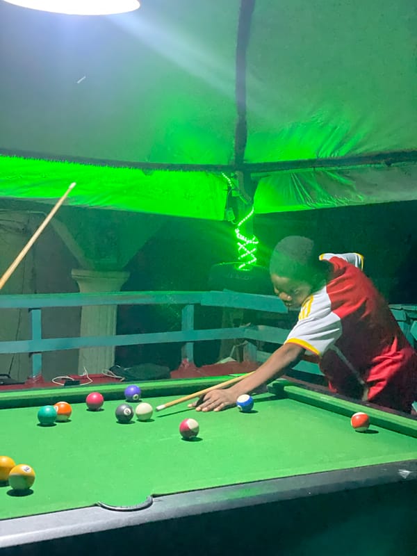 Evening billiards game captured at Lokoja recreational facility