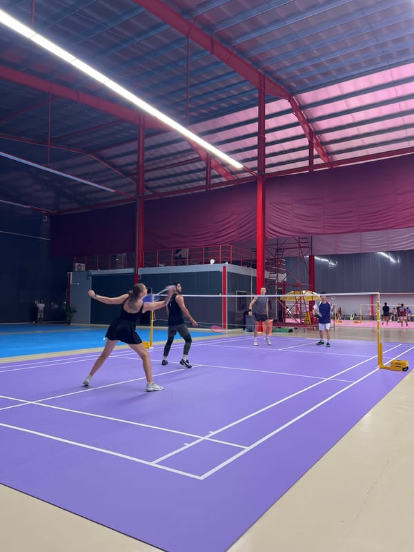 Badminton game played on purple court in Ko Samui