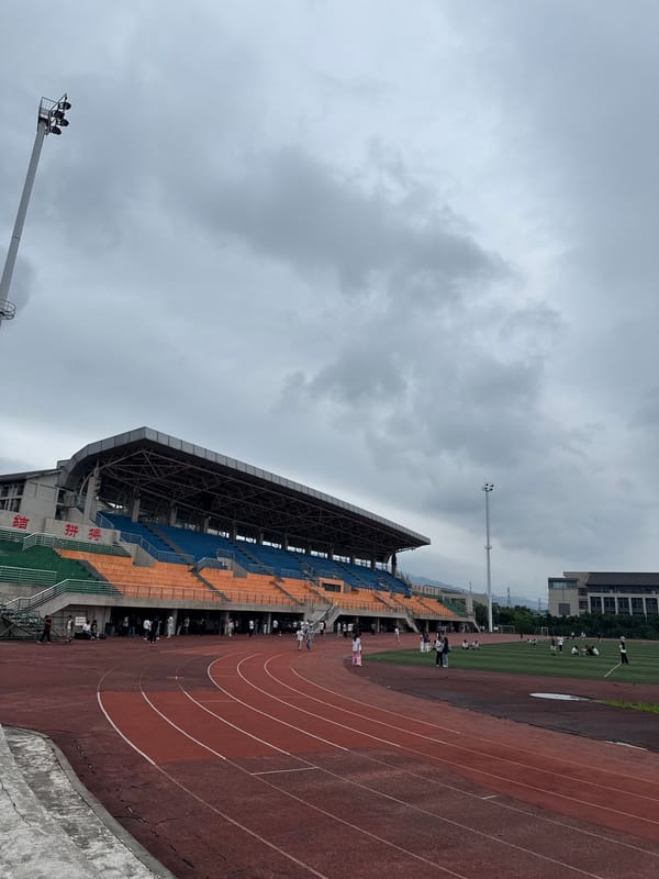 Community event with dragon dance performance in Jiangjin stadium