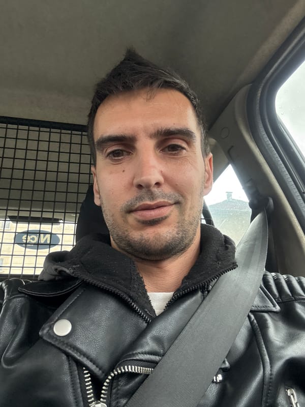 Man takes selfie while seated in vehicle in Plovdiv