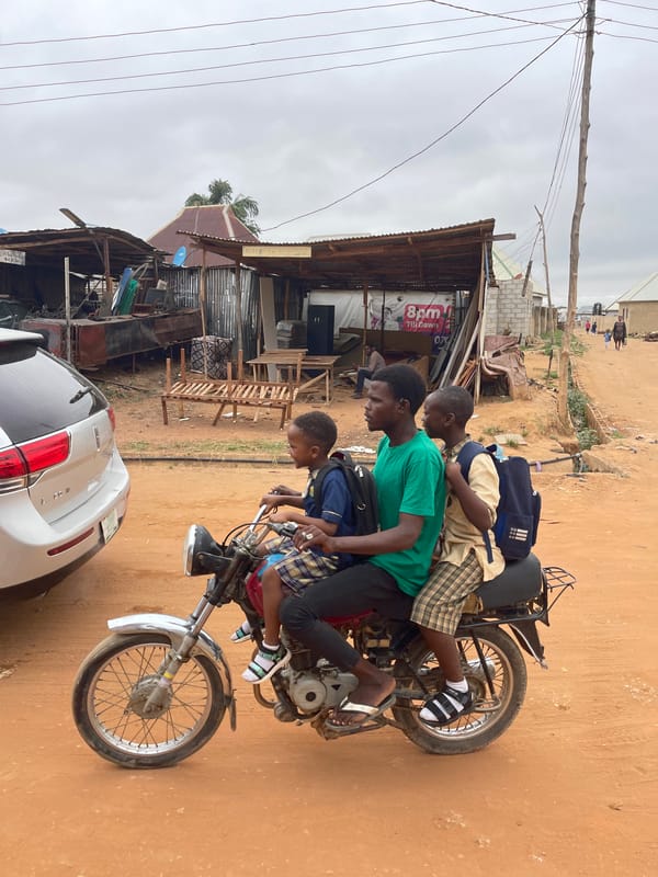 Morning street life unfolds in Kuchingoro, Nigeria