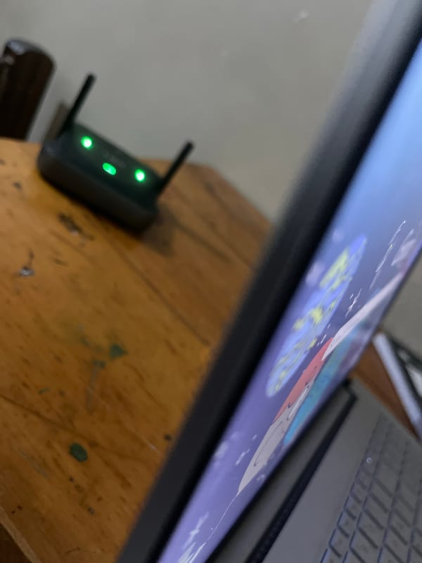 Person documents home office setup in Dar es-Salaam