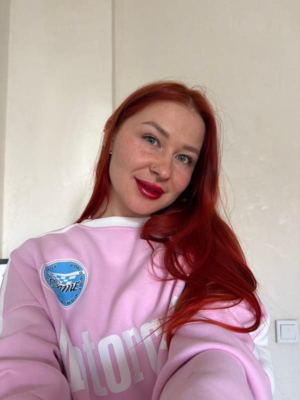 Red-haired woman takes selfies in Rostov-on-Don