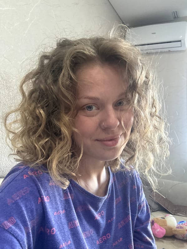 Indoor selfie in Mikhaylovsk, purple AERO t-shirt