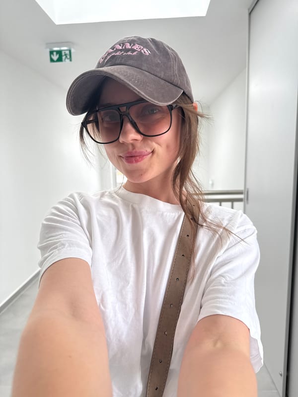 Woman documents casual afternoon stroll in Hungarian lakeside town