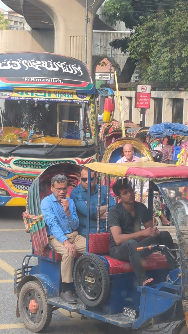Rush hour traffic and street activity captured across Dhaka