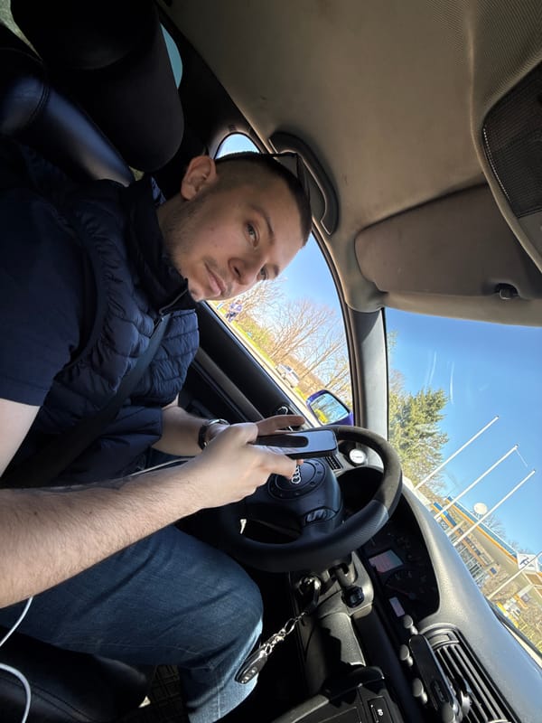 Driver photographing from stationary Audi near Bulgarian gas station
