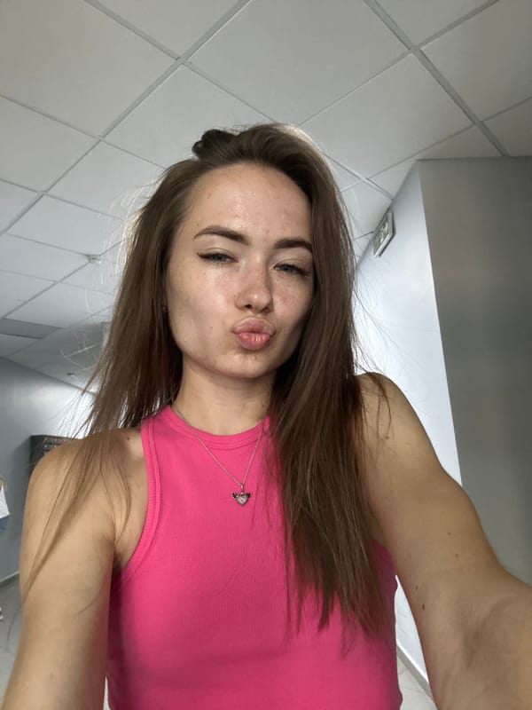 Selfie series outdoors and indoors, pink tank top, city backdrop
