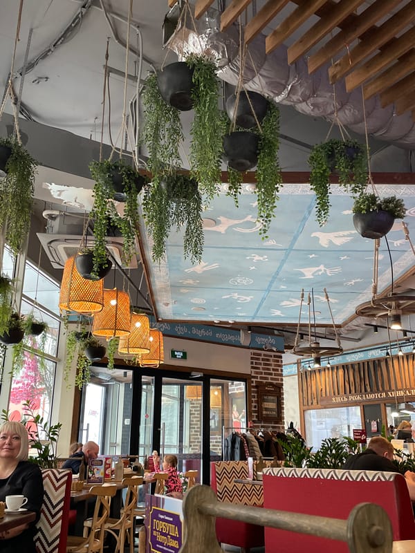 Morning scenes from snowy Izhevsk: restaurant life, cityscape