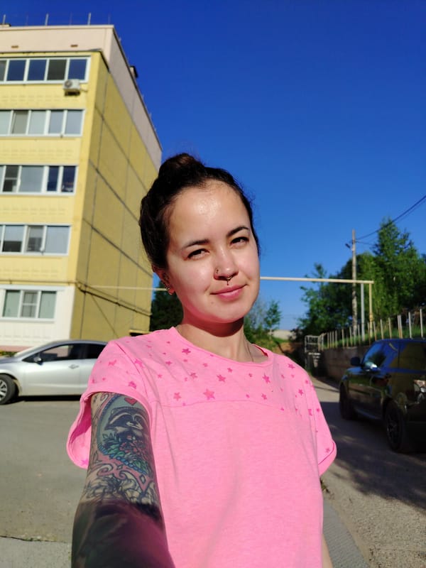 Woman takes selfie in Noviy, Russia early morning