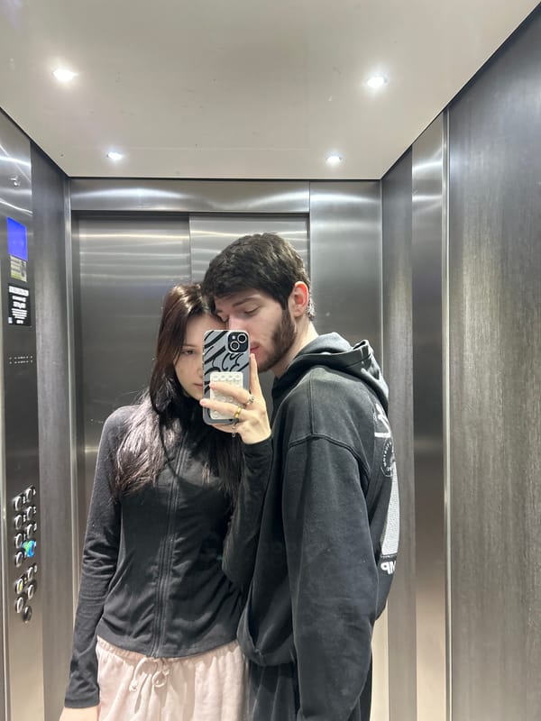 Couple Takes Selfie in Elevator in Cachan, France