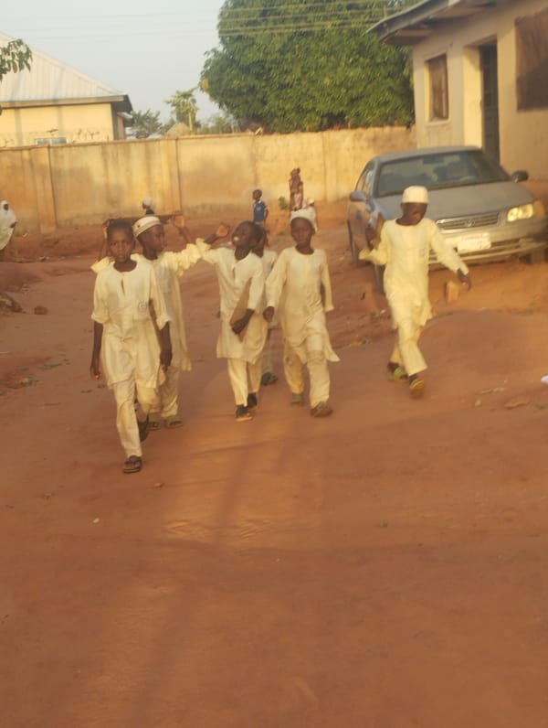 Daily life captured in Tumfure, Nigeria street scenes