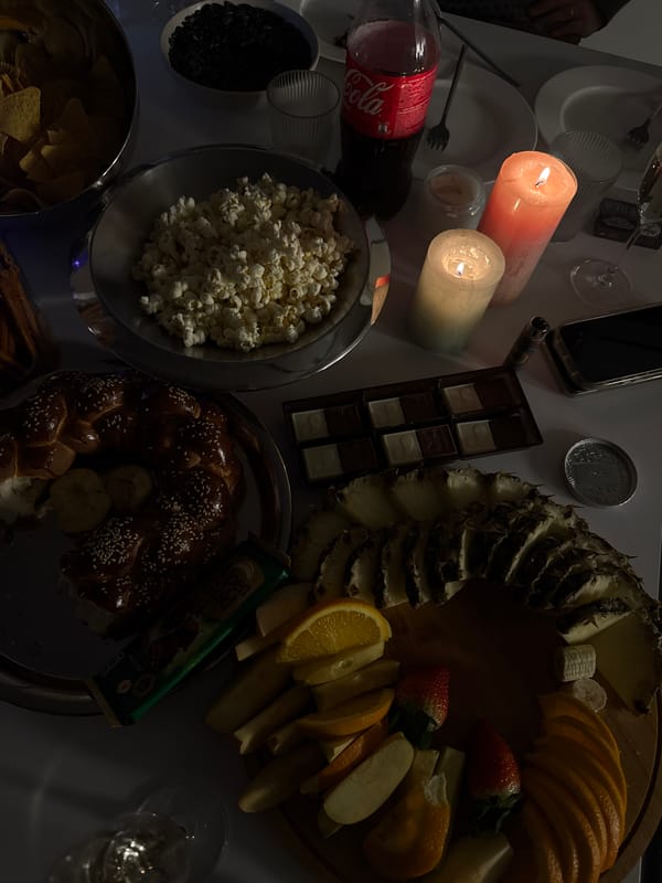 Food gathering documented in Yerevan with snacks and candlelight