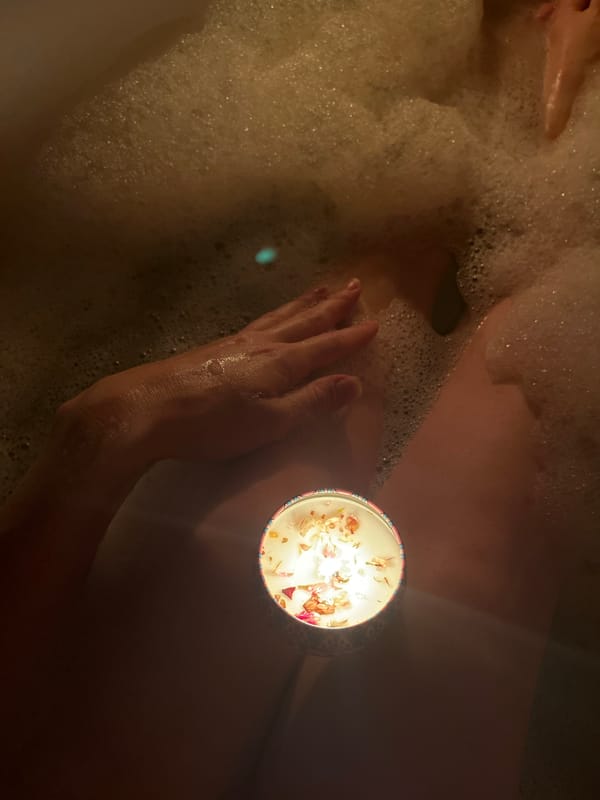 Evening bath with candles captured in Kazan home