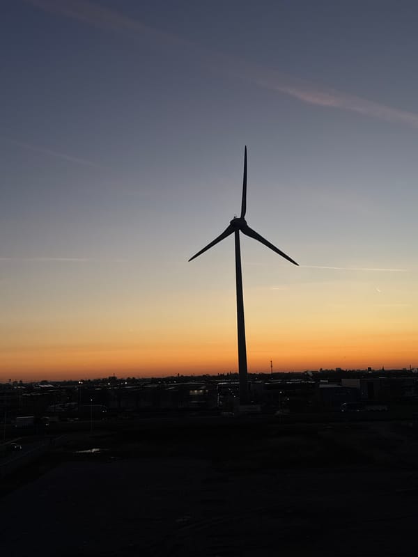 Wind turbine sunset captured in Maasdijk, Netherlands