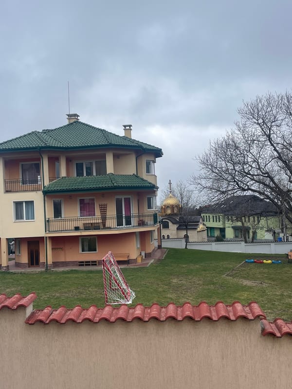 Sofia building observed near soccer field and domed church