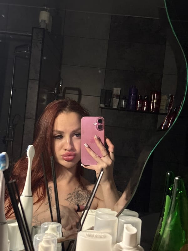 Woman takes bathroom selfies in Simferopol, Ukraine