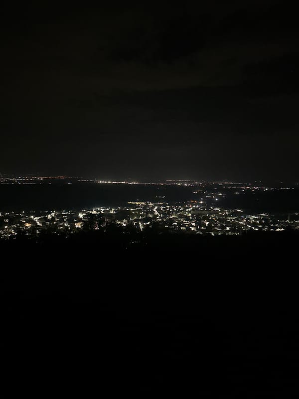 Night panorama captured of illuminated settlement in Perushtitsa, Bulgaria