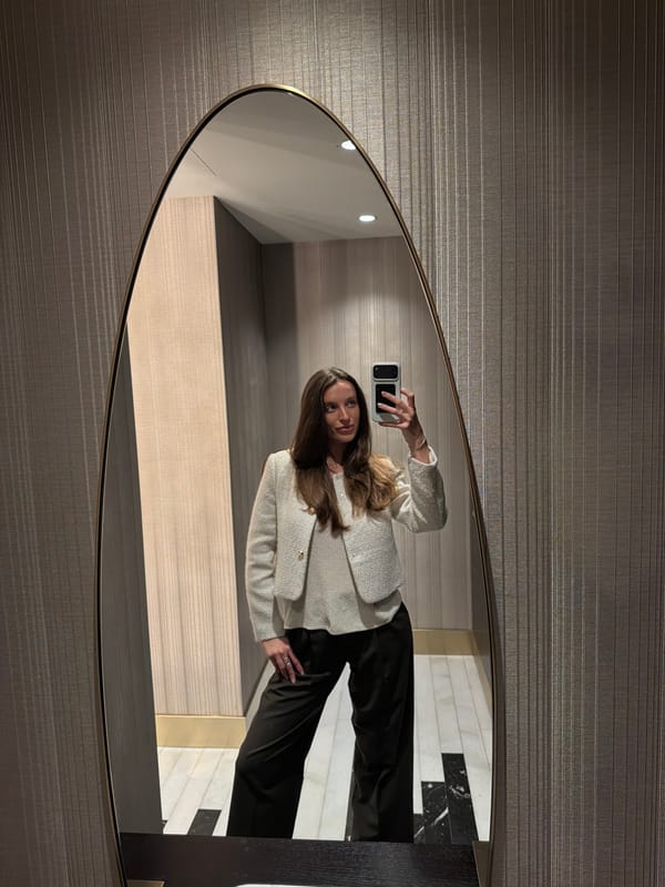Woman Takes Mirror Selfies in Budva Hotel Room