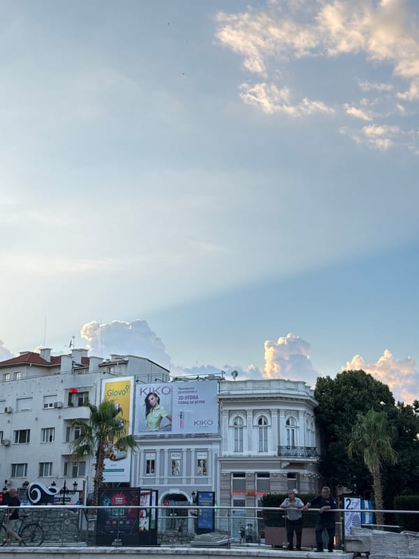 Plovdiv's historic center at golden hour, cafes and minarets