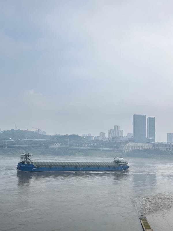 Quiet morning activity along Jiangjin's riverside promenade