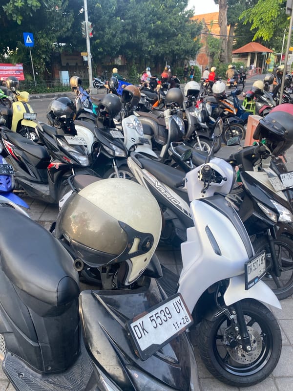 Morning at Bajra Sandhi: monuments, chess, and Denpasar street life