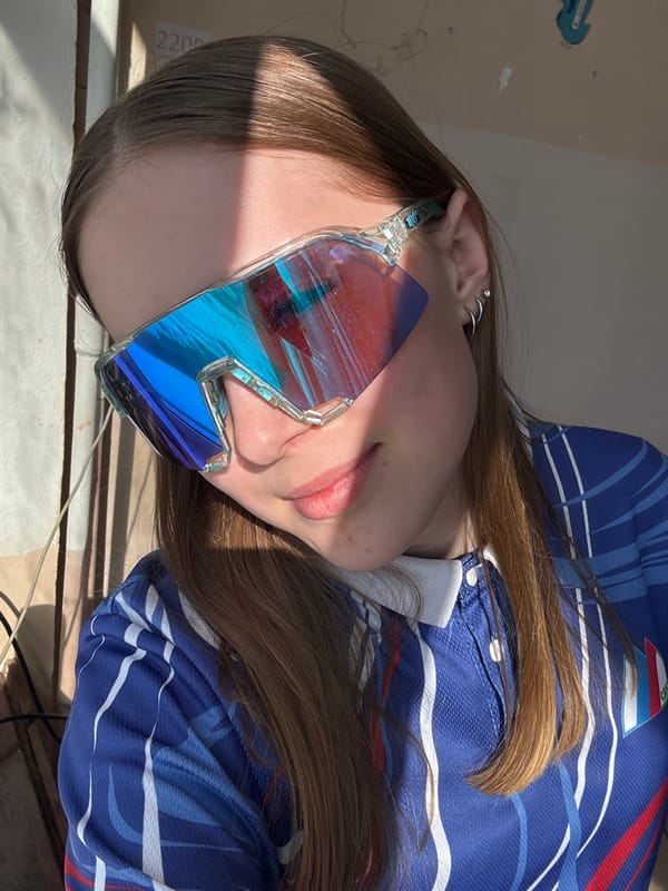 Athlete celebrates gold medal win at Russian regional sports competition