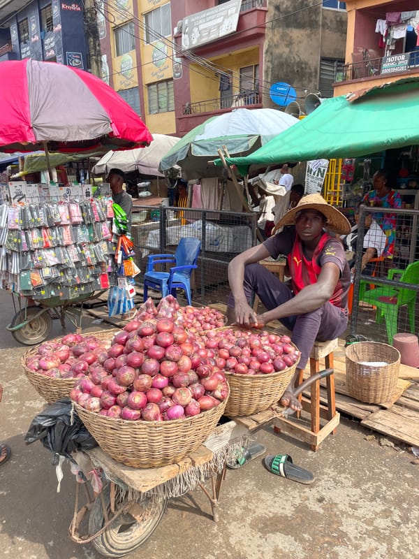 Morning street life and market activity across Onitsha and Fegge