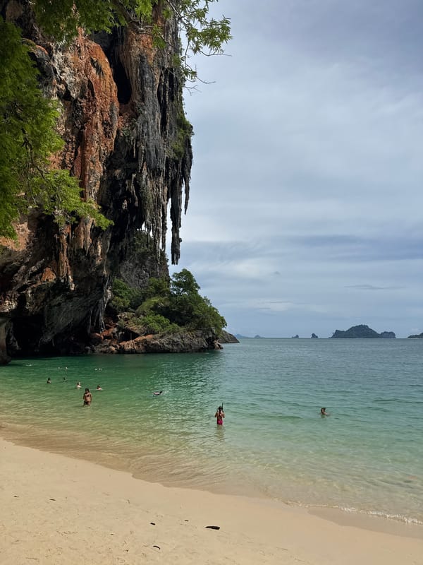 Caves, karst cliffs, and calm waters around Railay Beach, Krabi