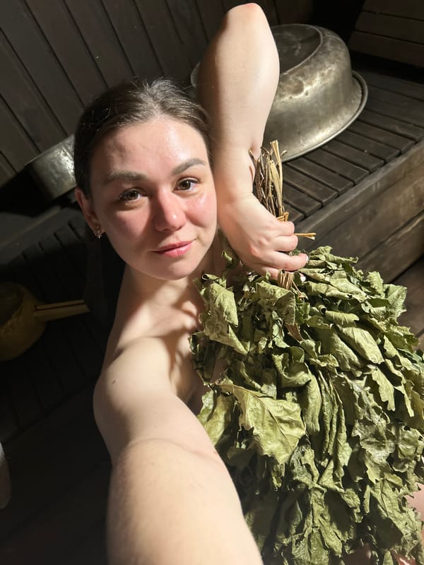 Woman enjoys traditional banya experience in Chaikovsky, Russia
