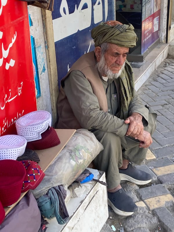 Elderly man in traditional dress observed in Quetta