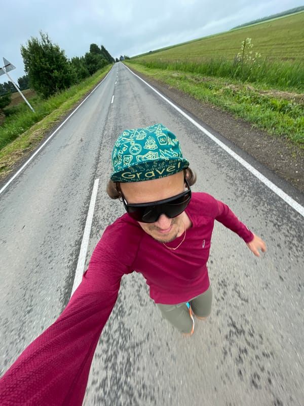 Skateboarding through open green fields, two angles