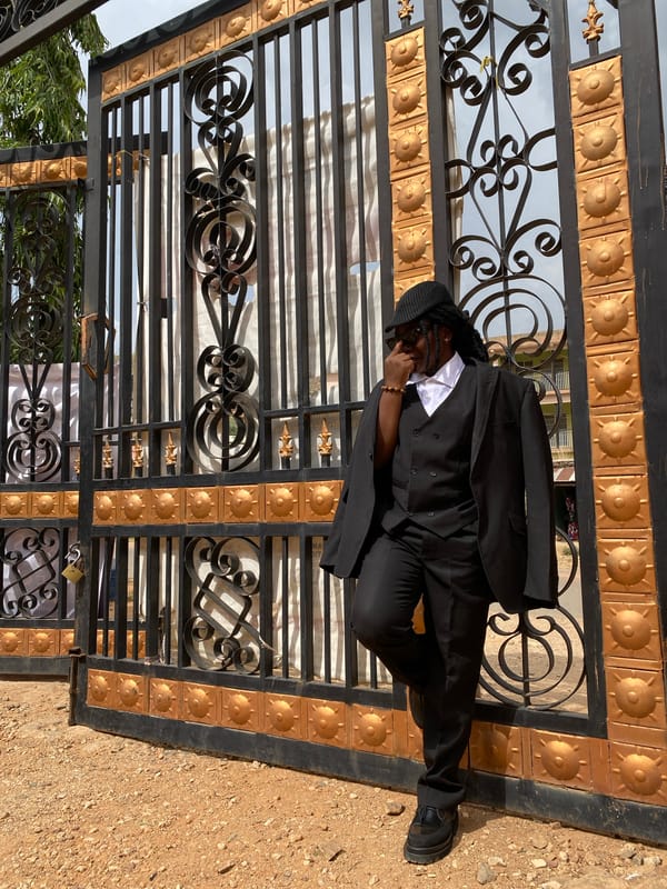 Photo session at ornate gate in Gwong, Nigeria