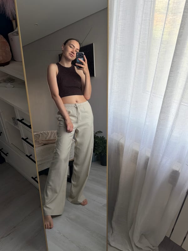 Mirror selfie in Chaikovsky, brown top and wide-leg pants