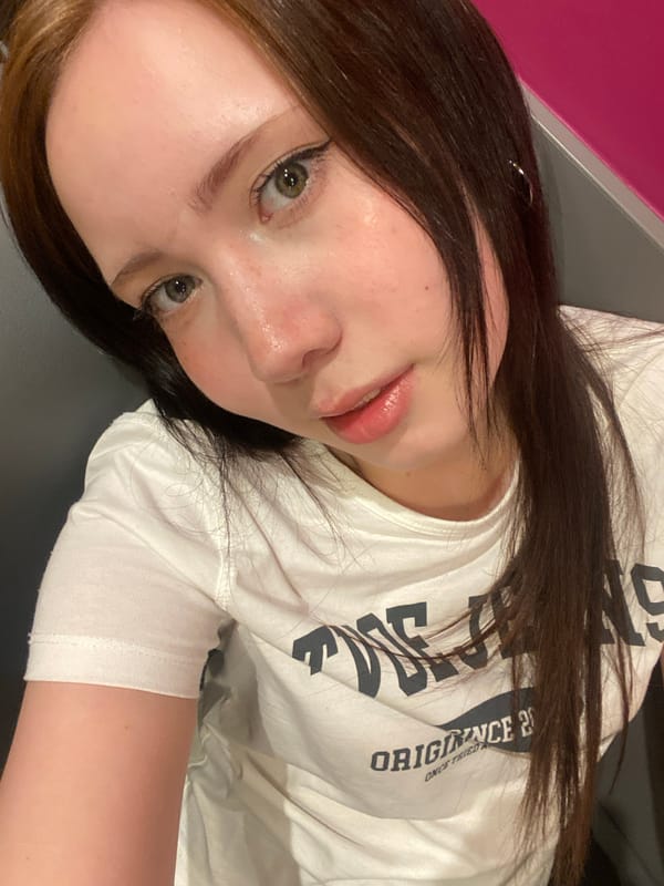 Close-up portrait of young woman captured by witness