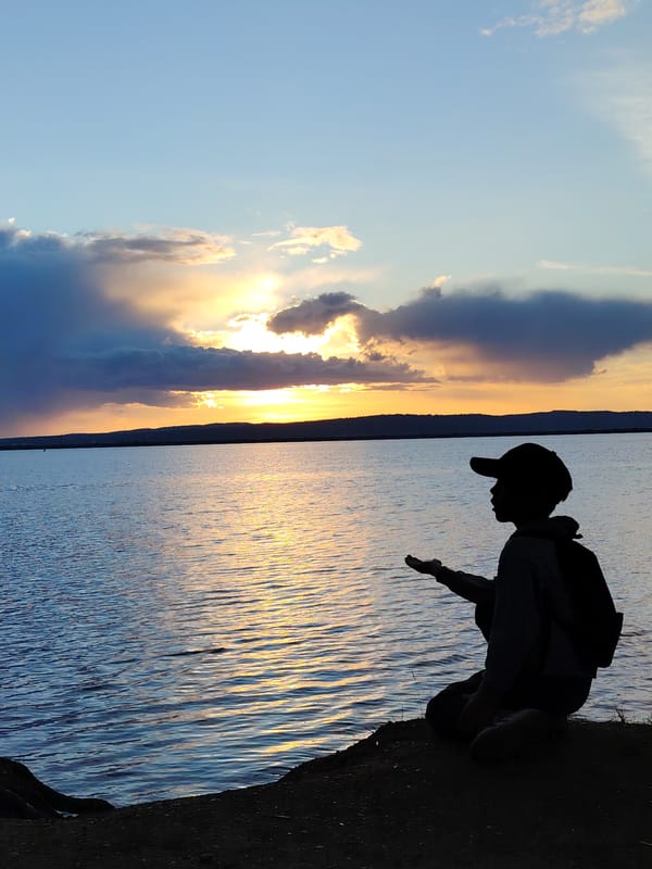 Evening sunset gathering captured along Kama River in Chaikovsky