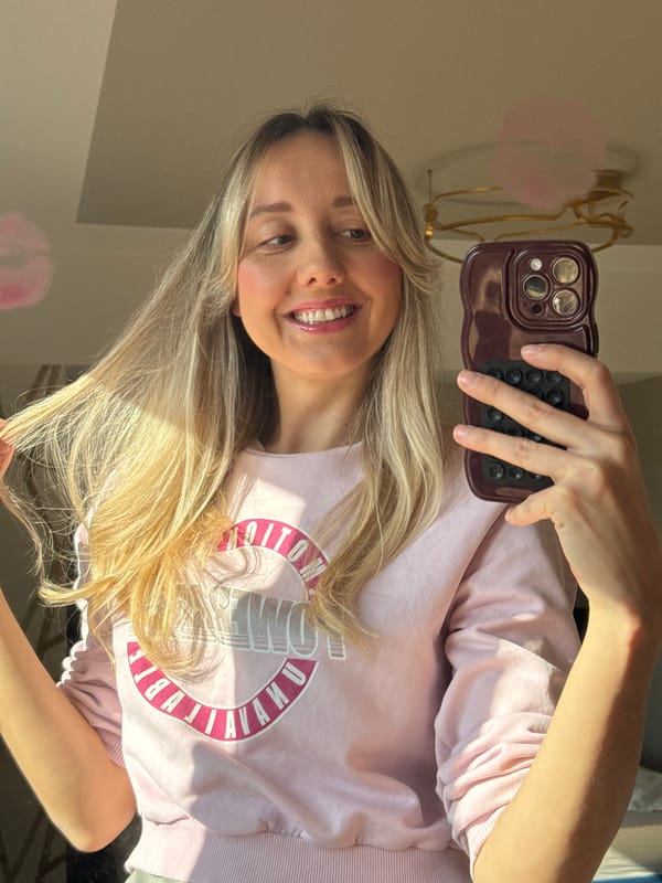 Woman documents morning makeup routine in Carnikava, Latvia
