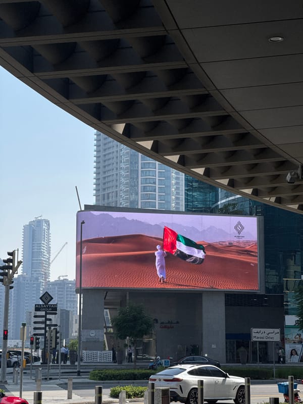 Alsayyah Group UAE flag advertisement displayed on Business Bay LED screen