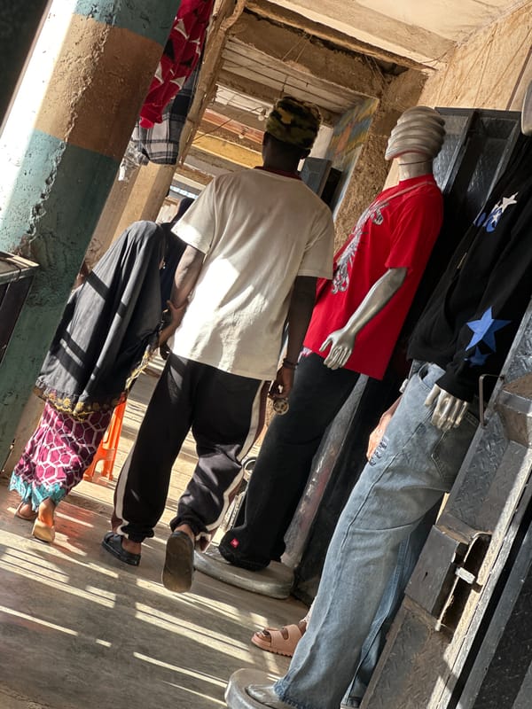 Street commerce and daily hustle in Bukuru's busy market district