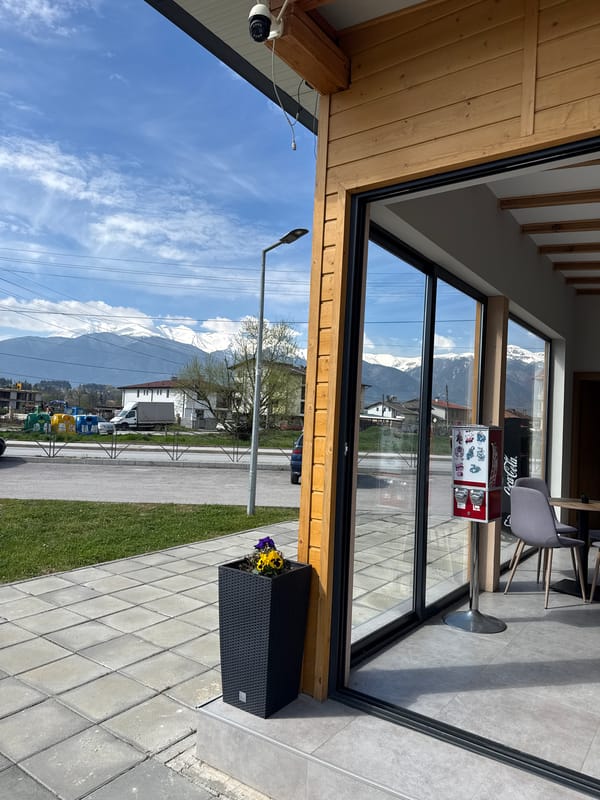 Morning views of Razlog streetscape and mountain landscape documented