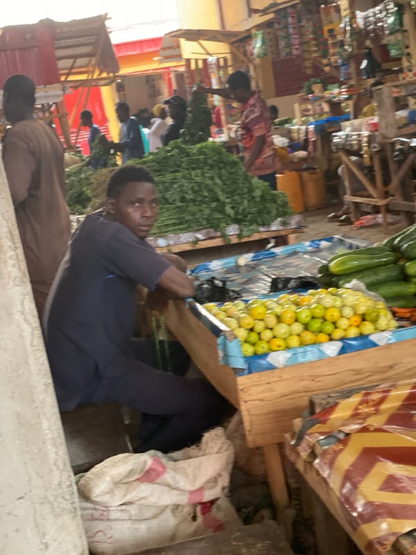 Vegetable vendors serve customers at Kafanchan B marketplace